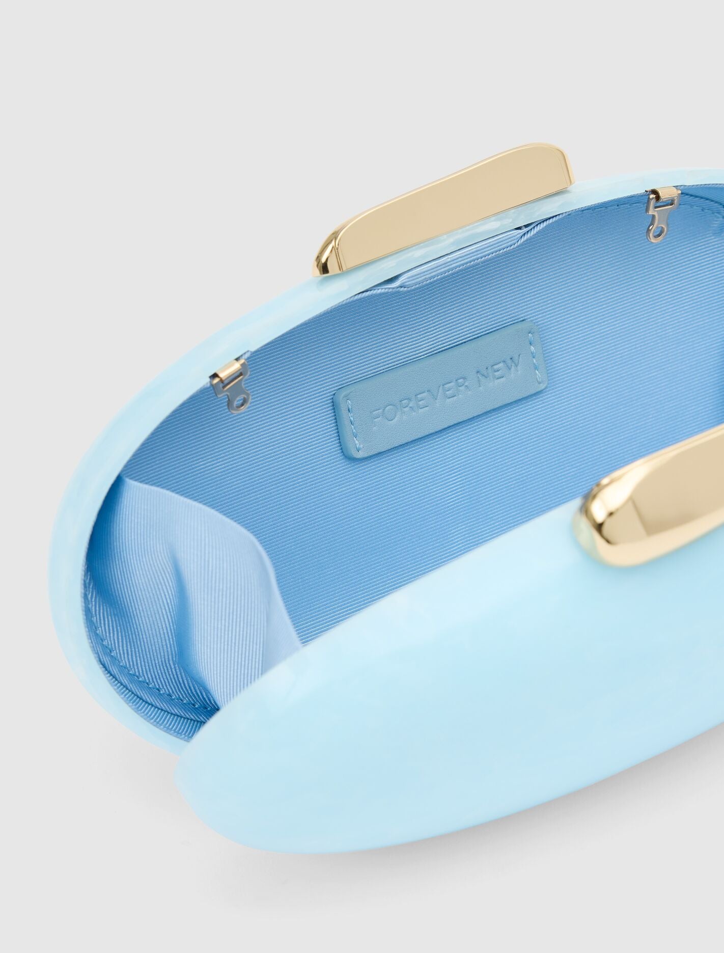 Peyton Oval Hardcase Clutch Forever New